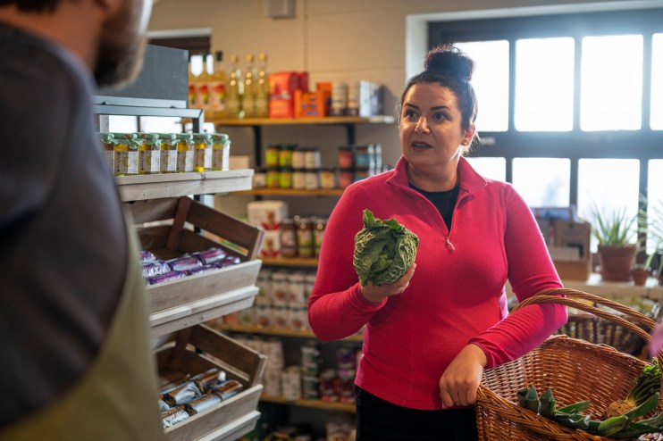Grocery shopping, looking for discounts instead of high-end shops.