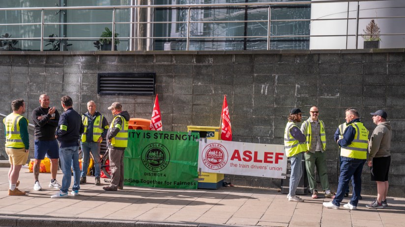Members of the Aslef union on a picket line near to Leeds train station, as Aslef union members walk out in the long-running dispute over pay and conditions. Photo credit should read: Danny Lawson/PA Wire