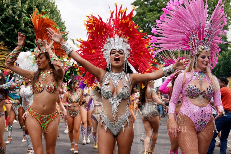 Performers at the Notting Hill Carnival in London. PA