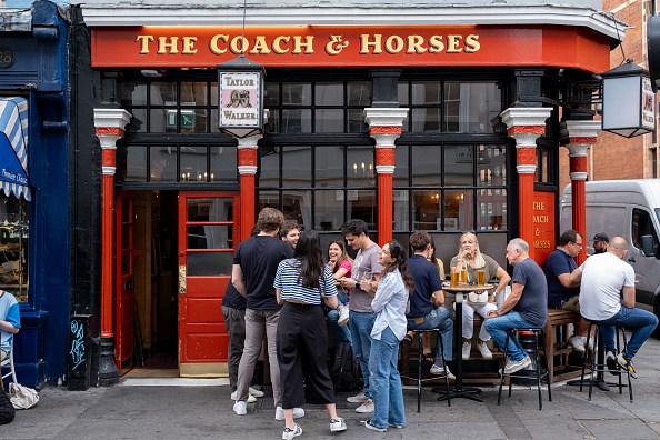 Brits heading out to Christmas parties helped drive spending in bars and pubs by 7.9 per cent in December, quashing fears that the period could be a wash out due to rail strikes.