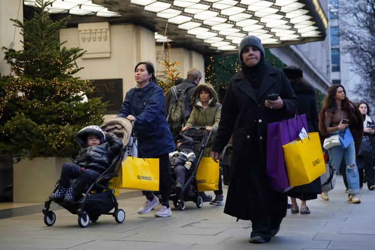 The number of in-person shoppers has dropped on Christmas Eve amid Sunday trading hours and the cost of living crisis.