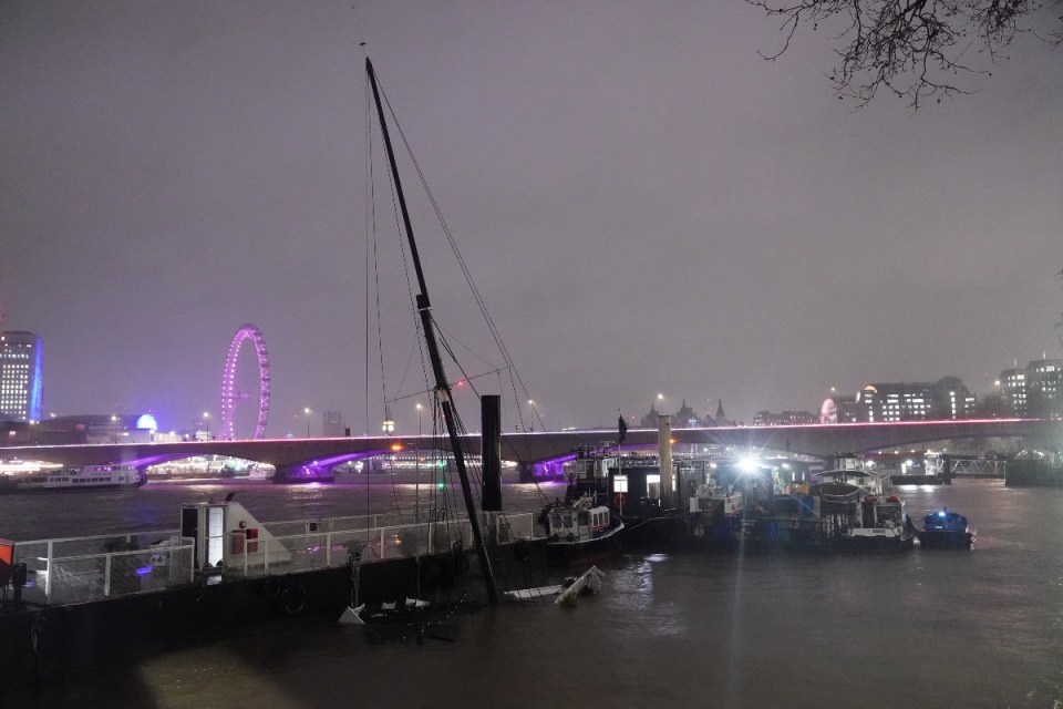 The mast of the Bar & Co boat, which was moored at Temple Pier juts from the water after the London party boat which acts as a floating bar, restaurant and nightclub sunk in the River Thames. A spokesperson for the Bar & Co boat, told the PA news agency: "Likely it sunk because of weather conditions." A yellow weather warning for rain was issued by the Met Office, covering London and the south of England, until 3am on Friday. Picture date: Thursday January 4, 2024. PA Photo. See PA story WEATHER Rain. Photo credit should read: James Manning/PA Wire