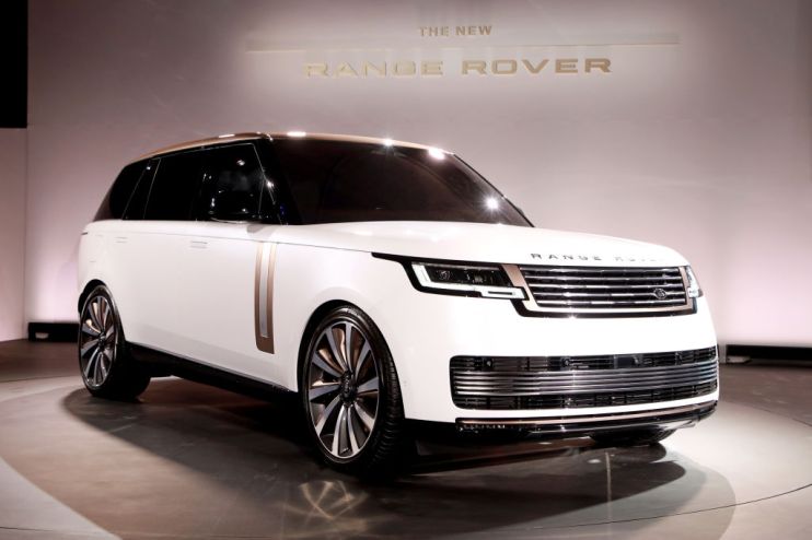 LOS ANGELES, CALIFORNIA - NOVEMBER 15: The new Range Rover is seen onstage during The Range Rover Leadership Summit at the Academy Museum of Motion Pictures on November 15, 2021 in Los Angeles, California. (Photo by Joe Scarnici/Getty Images for Jaguar Land Rover)
