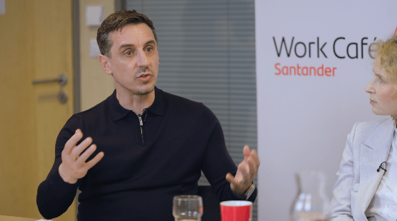 Gary Neville hosting a meeting at the Santander office in Warsaw, Poland