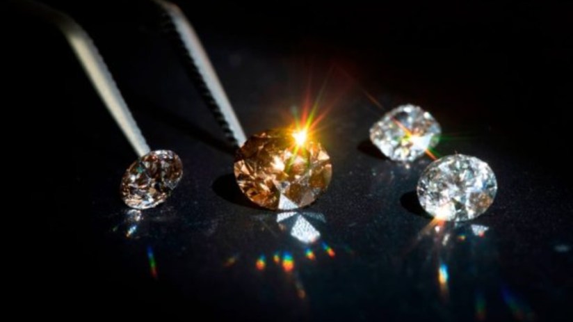 The company said it decreased diamond production through the first quarter by almost one quarter.