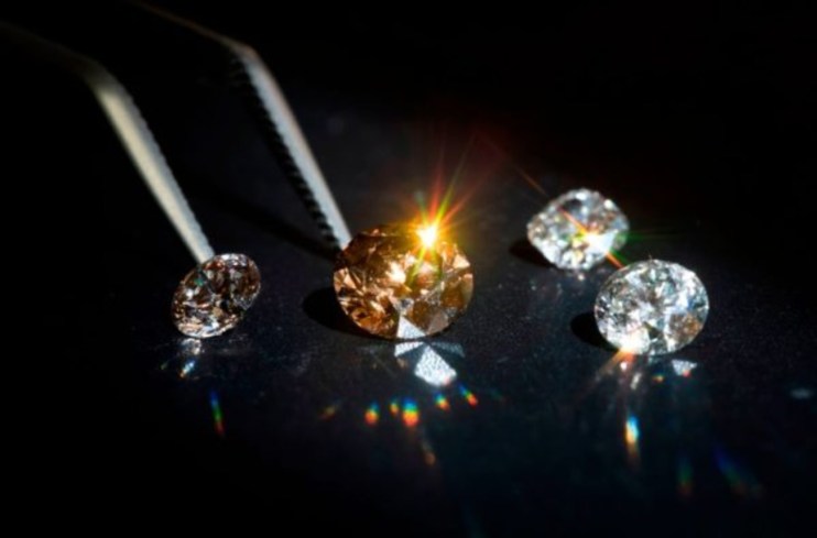 The company said it decreased diamond production through the first quarter by almost one quarter.