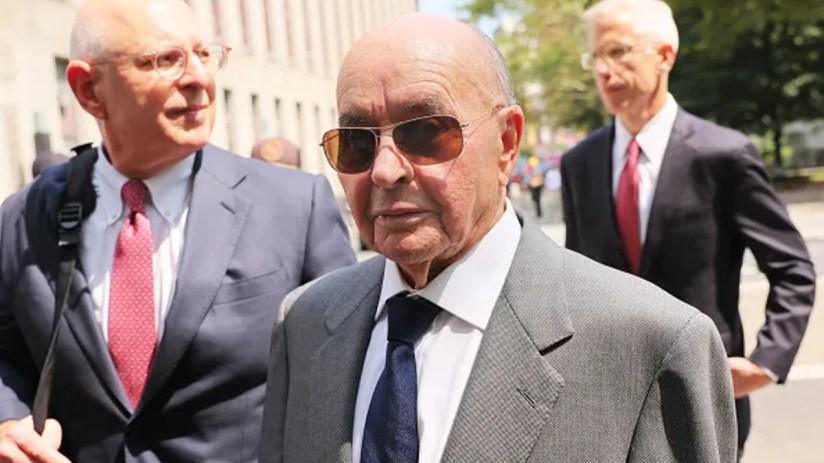 British billionaire former owner of Tottenham Hotspur Joe Lewis is escorted by his attorneys after leaving Manhattan Federal Court on July 26, 2023 (Photo by Michael M. Santiago/Getty Images)