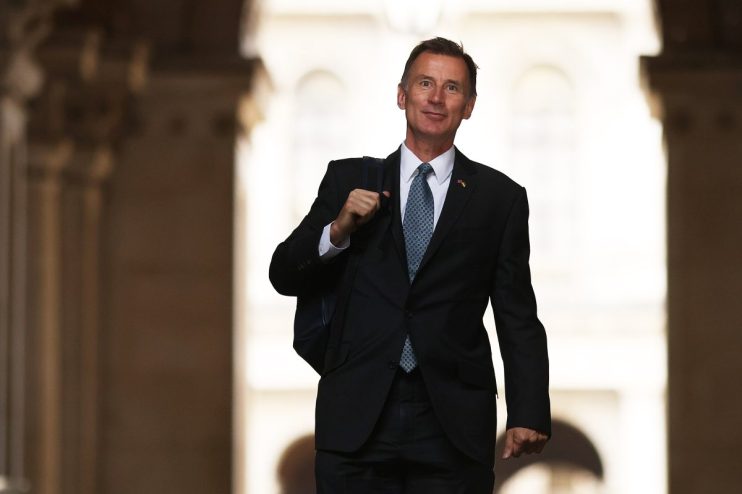 LONDON, ENGLAND - OCTOBER 26: Chancellor Jeremy Hunt arrives at Downing Street to attend the first meeting of the Prime Minister's cabinet on October 26, 2022 in London, England. Rishi Sunak's newly formed cabinet featured ministers from both his predecessors' governments. (Photo by Dan Kitwood/Getty Images)