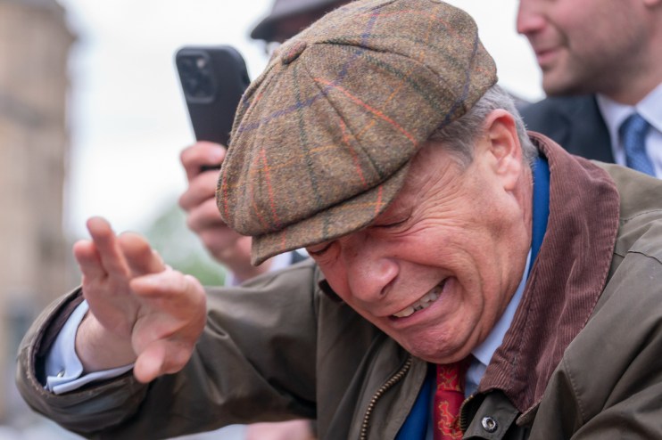 A man has been arrested after objects including &ldquo;cement&rdquo; were thrown at Reform UK leader Nigel Farage. Photo: PA