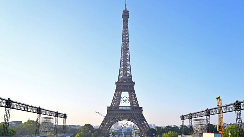 The Olympic Rings are displayed on the Eiffel Tower - 50 days before the opening of the Olympic Games