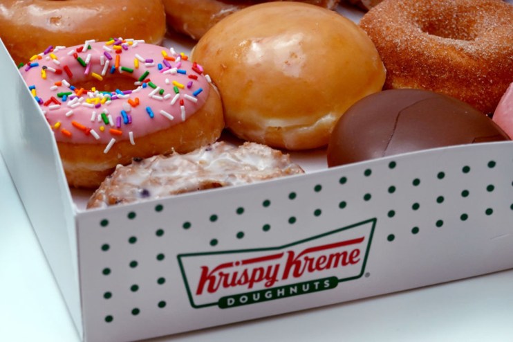 Krispy Kreme increased its UK prices as it eyed expansion into "high profile" locations.