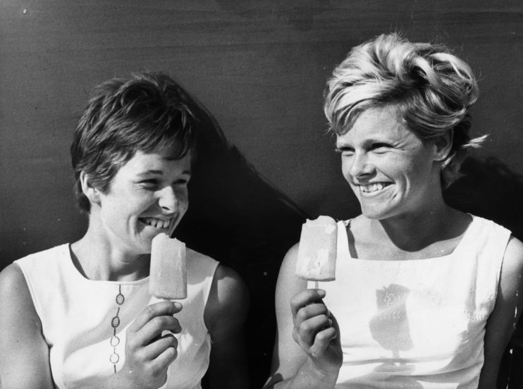 9th June 1969: Competitors in the Kent Allcomers Championship at Beckenham, Kent, enjoy an ice lolly after their match. Winnie Shaw (left) beat Beverley Vercove in three straight sets. (Photo by Jim Gray/Keystone/Getty Images)