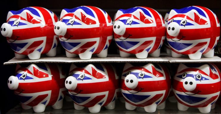 LONDON - JANUARY 23: Piggy banks painted with the Union Flag go on sale in a shop on Oxford Street.(Photo by Oli Scarff/Getty Images)