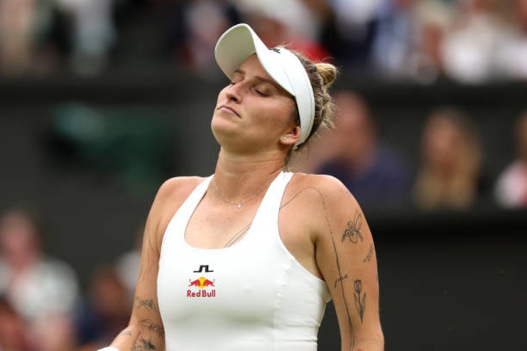 The women&rsquo;s singles defending Wimbledon champion Marketa Vondrousova was beaten at the All England Club in a huge day two shock.