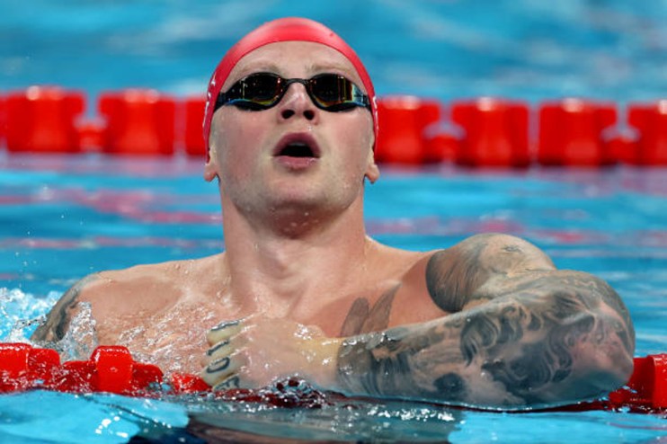 Adam Peaty&rsquo;s attempt at three 100m breaststroke golds in three consecutive games was denied by Italy&rsquo;s Nicolo Martinenghi yesterday in Paris.