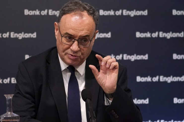 Bank of England headquarters with digital currency symbols, highlighting new stablecoin regulation changes in the UK market