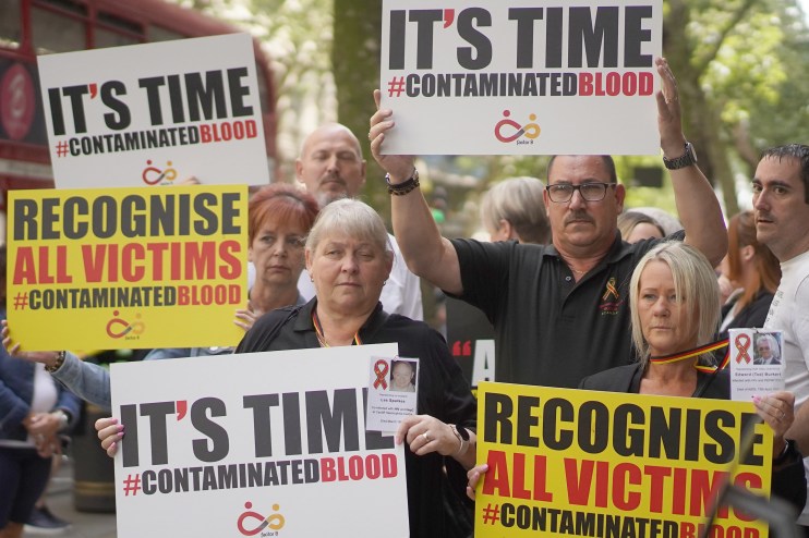 Campaigners, including many who are personally infected and affected by infected blood, gather in Westminster, London, calling for compensation. Photo credit should read: Victoria Jones/PA Wire