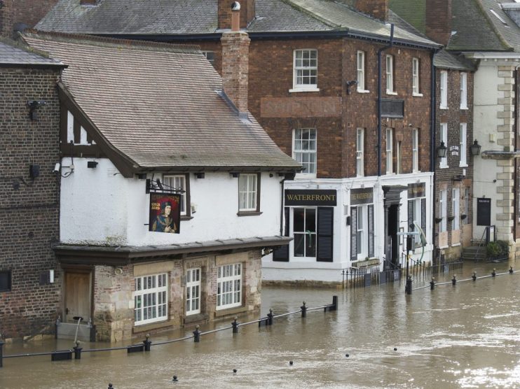 Rain, claims, and shine: UK insurers flooded by &pound;1.4bn property claim surge