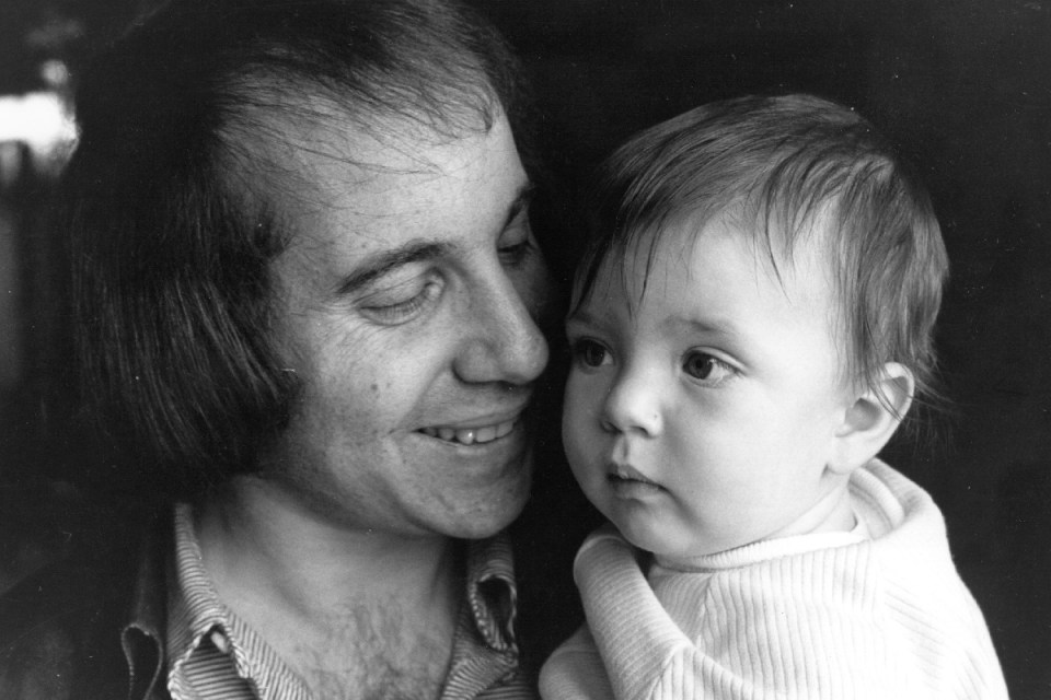 Singer, songwriter and guitarist Paul Simon, famous for his partnership with Art Garfunkel. He is pictured with his son Harper. (Photo by Express Newspapers/Getty Images)
