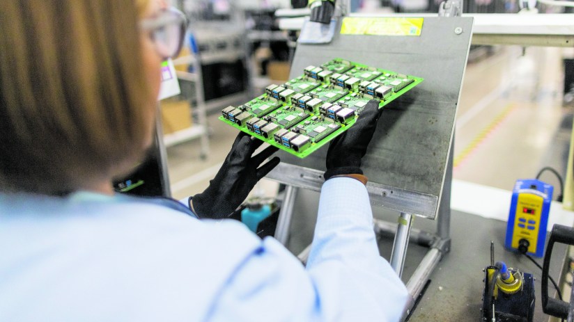 An employee performs quality control checks on Raspberry Pi personal computers on the production line at the Sony UK Technology Centre in Pencoed, UK, . Photographer: Chris Ratcliffe/Bloomberg via Getty Images