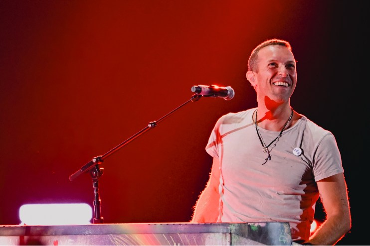 Coldplay concert packed with fans as ticket prices soar on resale markets, highlighting 2025 touting issues.
