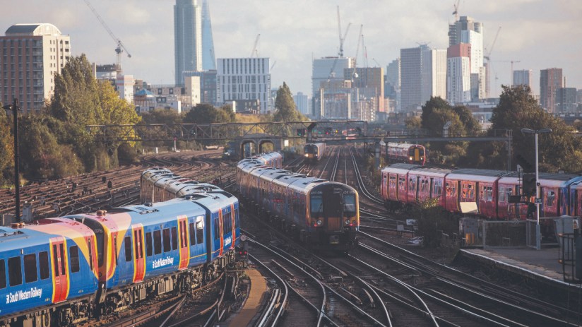 SWR was previously owned by FirstGroup and MTR Corporation, but is now the responsibility of DfT (Department for Transport) Operator. (A South Western train arrives at Clapham Junction. Photo by Jack Taylor/Getty Images)