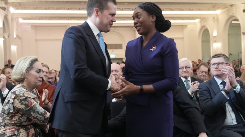 Kemi Badenoch is congratulated by Robert Jenrick after being announced as the new Conservative Party leader (Stefan Rousseau/PA Wire)