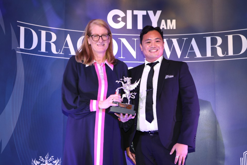 Kate Grussing CBE of Sapphire Partners, Advisor of the Year, pictured with THG's chief sustainability officer, Mark Jones.  Morning Wire Dragon Awards 2024 at Mansion House. (Credit: Gretel Ensignia)