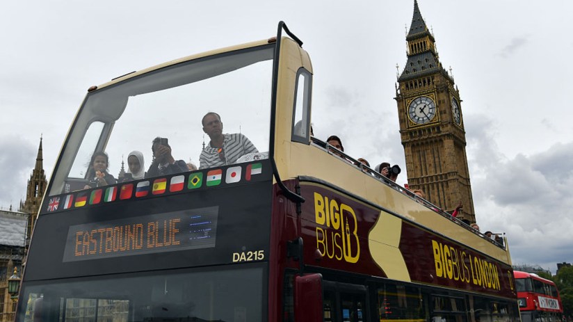 The company behind London Big Bus Tours has significantly cuts its pre-tax loss. (Photo by Carl Court/Getty Images)
