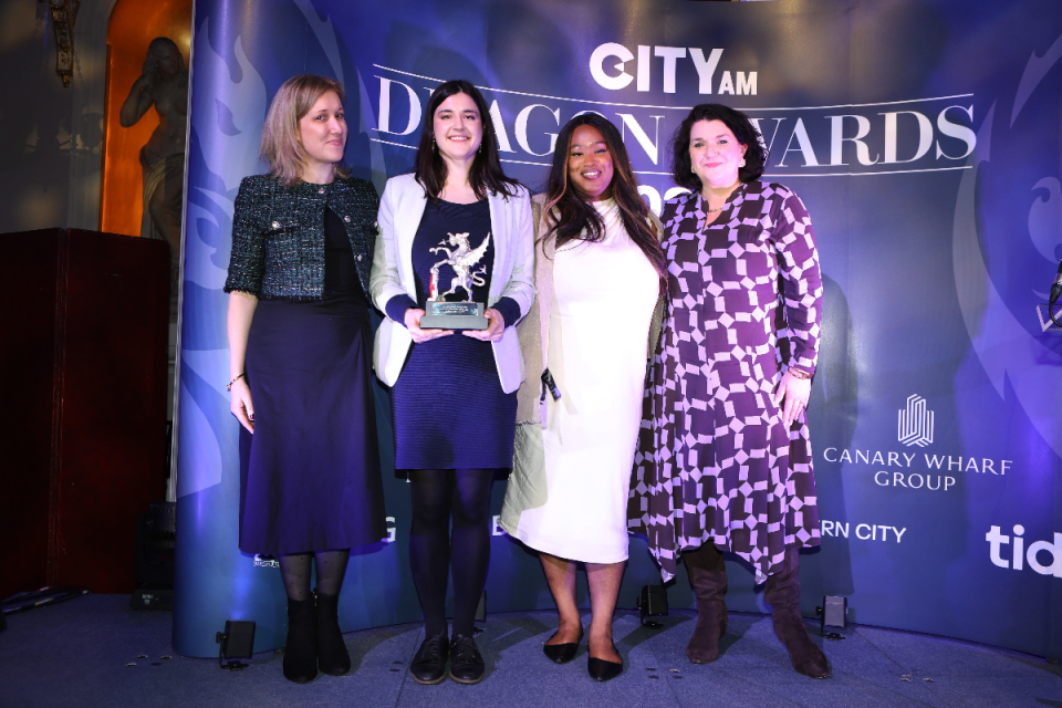 Natasha Stromberg (far left), alongside Anna Shattles and Twinelle Baidoo of Investor Action on Antimicrobial Resistance were presented by the award by Eastern City BID CEO Kate Hart (right). Morning Wire Dragon Awards 2024 at Mansion House. (Credit: Gretel Ensignia) 
