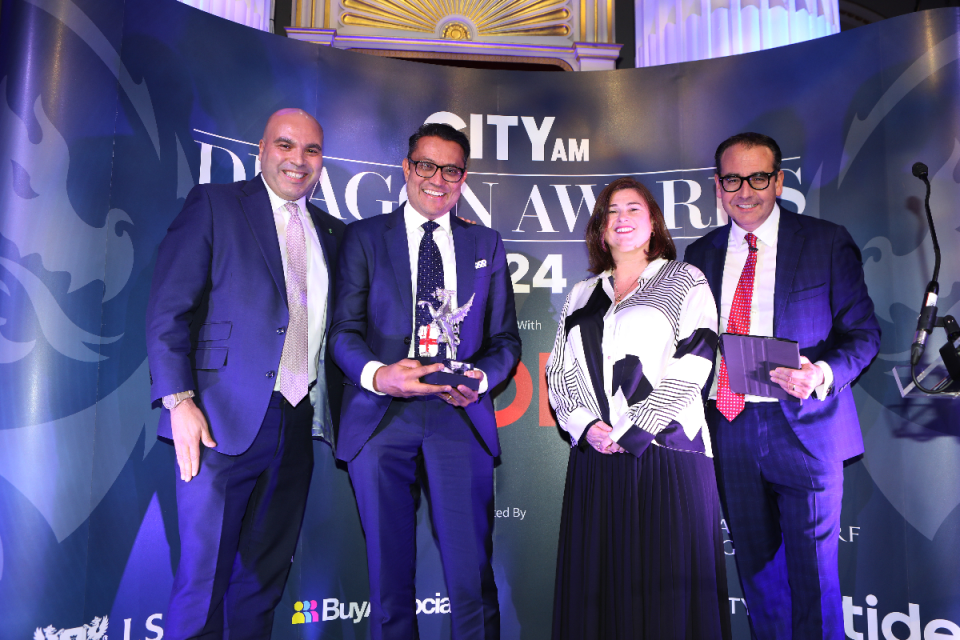 Holding the award, Rakesh Harji COO of Zilch with Ryan Mendy, Chief Communications Officer, alongside LSEG's Head of Sustainability Jane Goodland and Oli Barrett. Morning Wire Dragon Awards 2024 at Mansion House. (Credit: Gretel Ensignia) 