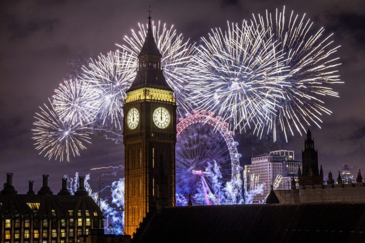 LONDON, ENGLAND - JANUARY 1: Fireworks light up the London skyline over Big Ben and the London Eye just after midnight on January 1, 2023 in London, England. London's New Years' Eve firework display returned this year after it was cancelled during the Covid Pandemic. (Photo by Dan Kitwood/Getty Images)