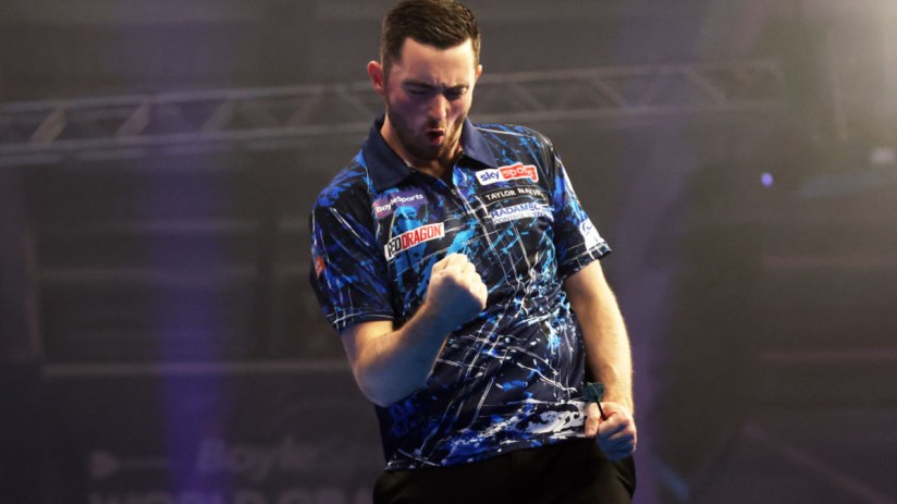 Luke Humphries of England celebrates victory over Ryan Joyce of England during the Semi-Final match on day six of the 2024 BoyleSports World Grand Prix darts at Mattioli Arena on October 12, 2024, in Leicester, England. (Photo by Cameron Smith/Getty Images)