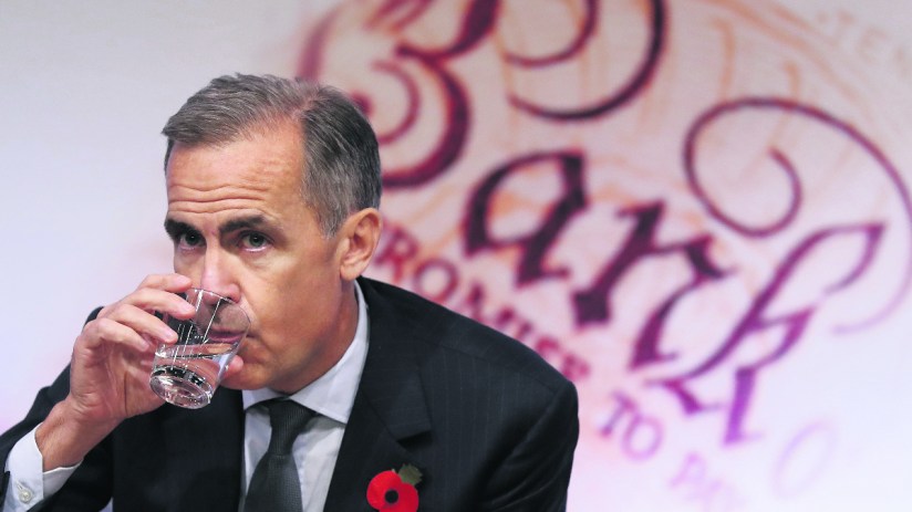 Former governor of the Bank of England, Mark Carney, takes a drink during the quarterly Inflation Report press conference at The Bank of England in London on November 3, 2016.(/ AFP / POOL / Kirsty Wigglesworth (Photo credit should read KIRSTY WIGGLESWORTH/AFP/Getty Images)