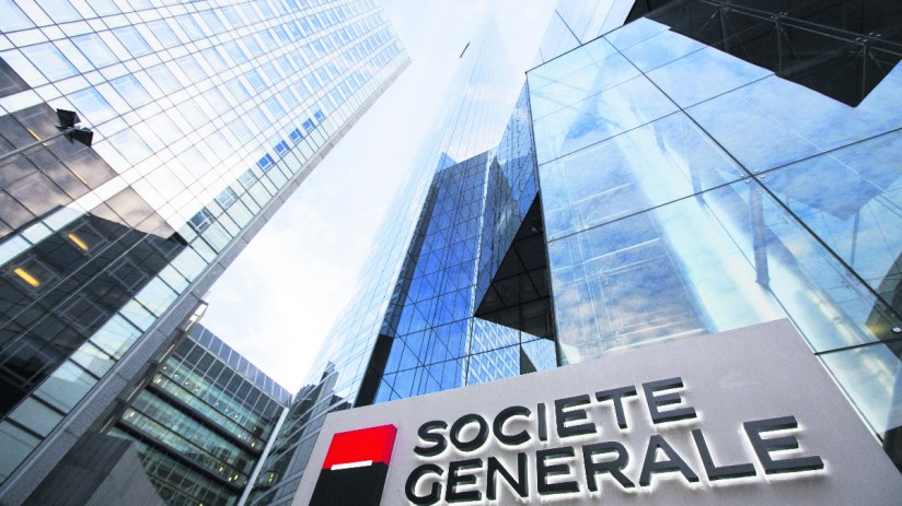 The Societe Generale SA logo sits on a sign outside the bank's headquarters in La Defense business district in Paris, France (Photographer: Jason Alden/Bloomberg via Getty Images)