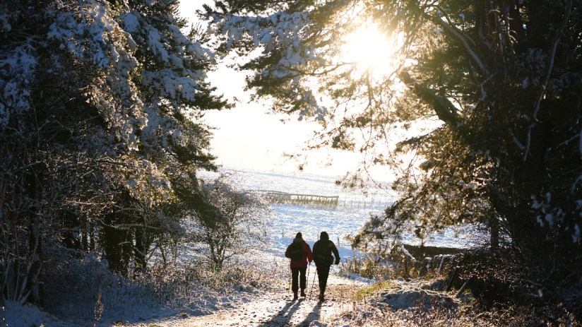 Large parts of the UK will be hit by heavy snow and freezing rain which could lead to disruption this weekend amid two amber weather warnings.