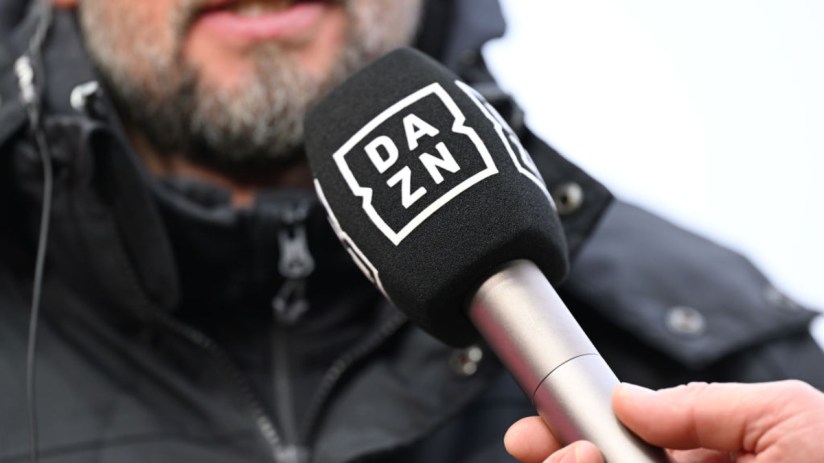 A microphone with the DAZN Logo is seen prior to the Bundesliga match between 1. FC Heidenheim 1846 and VfB Stuttgart at Voith-Arena on December 15, 2024 in Heidenheim, Germany. (Photo by Sebastian Widmann/Getty Images)