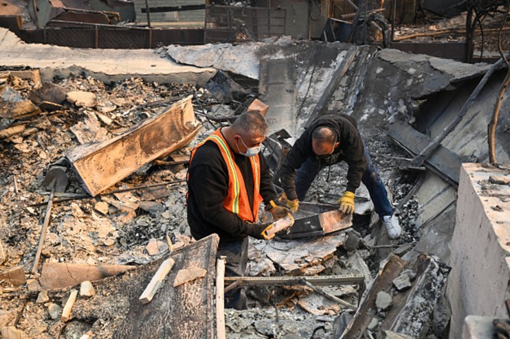 Residents search for valuables among the rubbles of their burnt houses during Eaton wildfire in Altadena of Los Angeles County, California, United States on January 9, 2025. . (Photo by Tayfun Coskun/Anadolu via Getty Images)