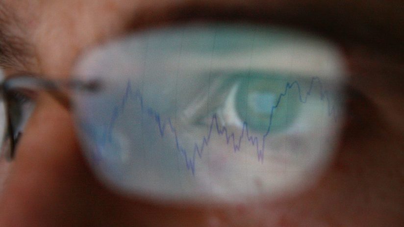 LONDON - OCTOBER 07: In this photo illustration, a graph is reflected representing the 12 month decline of the FTSE 100 share index on October 7, 2008 in London. Financial markets are still suffering large losses as the global banking crisis continued. (Photo by Peter Macdiarmid/Getty Images)