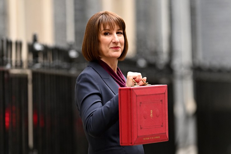 LONDON, ENGLAND - OCTOBER 30: Chancellor of the Exchequer, Rachel Reeves, poses with the red Budget Box&nbsp;as she leaves 11 Downing Street to present the government's annual budget to Parliament on October 30, 2024 in London, England. This is the first Budget presented by the new Labour government and Chancellor of the Exchequer, Rachel Reeves. (Photo by Leon Neal/Getty Images)