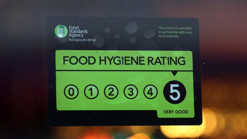 LONDON, ENGLAND - FEBRUARY 09: A Food Standards Agency rating certificate is pictured in the window of a restaurant on February 9, 2015 in London, England. Claims have been made that some restaurants are ignoring food hygiene standards ratings. (Photo by Carl Court/Getty Images)