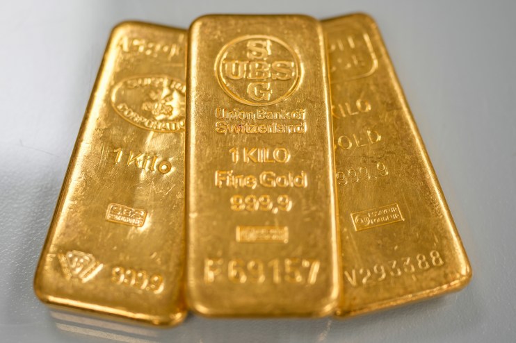 BIRMINGHAM, ENGLAND - DECEMBER 13: three 1kg gold bullion bars lay on the counter in a gold dealers in Birmingham's jewellery quarter on December 13, 2023 in Birmingham, England. Gold prices have increased since the Ukraine War but have soared to record highs since the start of the Hamas-Israel war. Other factors are the weakening US dollar and expected rate cuts from the Federal Reserve. (Photo by Christopher Furlong/Getty Images)