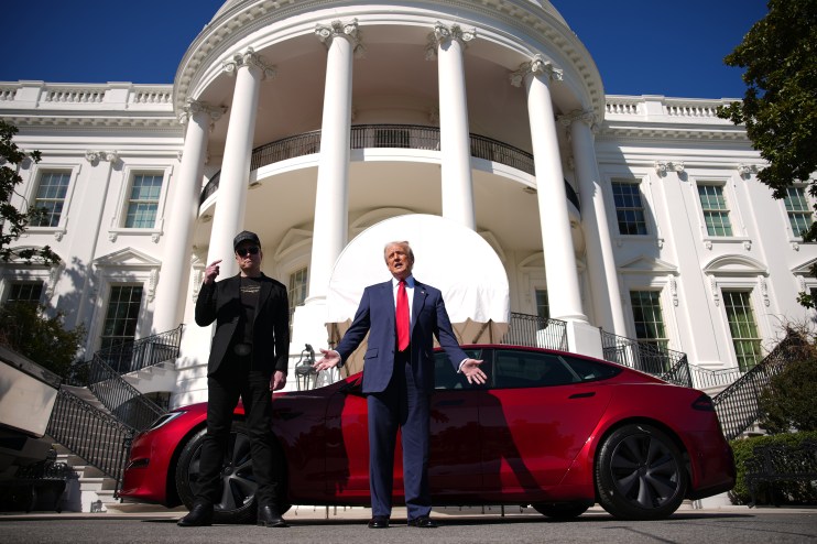 WASHINGTON, DC - MARCH 11: U.S. President Donald Trump and White House Senior Advisor, Tesla and SpaceX CEO Elon Musk deliver remarks next to a Tesla Model S on the South Lawn of the White House on March 11, 2025 in Washington, DC. Trump spoke out against calls for a boycott of Elon Musk&rsquo;s companies and said he would purchase a Tesla vehicle in what he calls a &lsquo;show of confidence and support&rsquo; for Elon Musk. (Photo by Andrew Harnik/Getty Images)