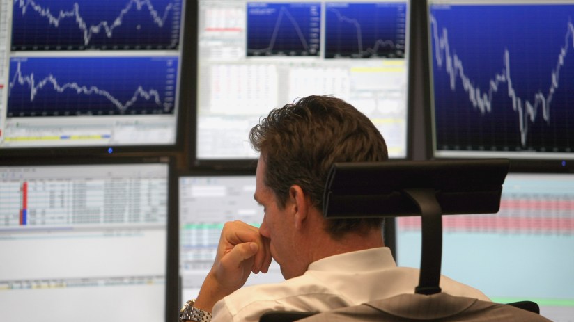FRANKFURT AM MAIN, GERMANY - SEPTEMBER 30: A trader looks on during a trading session on the floor of Frankfurt stock exchange on September 30, 2008 in Frankfurt am Main, Germany. Due to the weakness of the U.S. economy the German stock market remains volatile. The U.S. stocks took a nosedive in reaction to the global credit crisis and as the U.S. House of Representatives rejected the $700 billion rescue package. (Photo by Ralph Orlowski/Getty Images)
