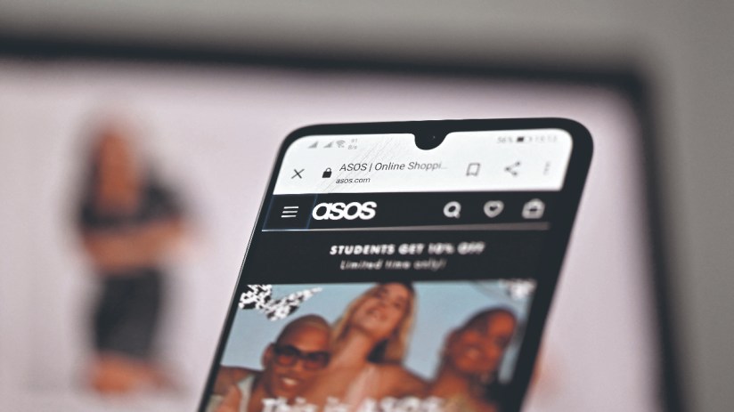 Asos stock performance graph showing over 2% decline despite reduced losses and 14% revenue drop in early 2023