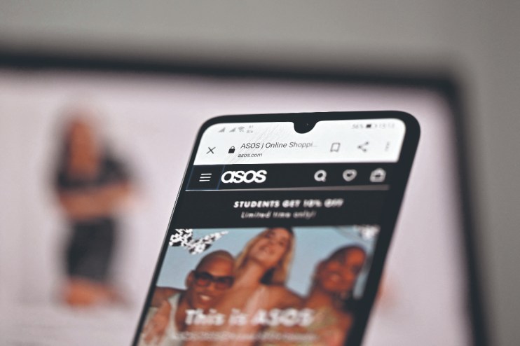 Asos stock performance graph showing over 2% decline despite reduced losses and 14% revenue drop in early 2023