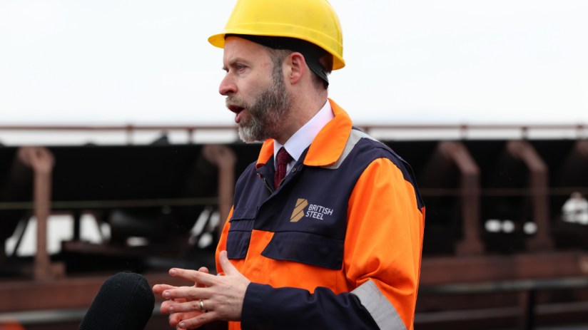 Business Secretary Jonathan Reynolds speaks as coking coal is unloaded at Immingham Port. Photo: PA