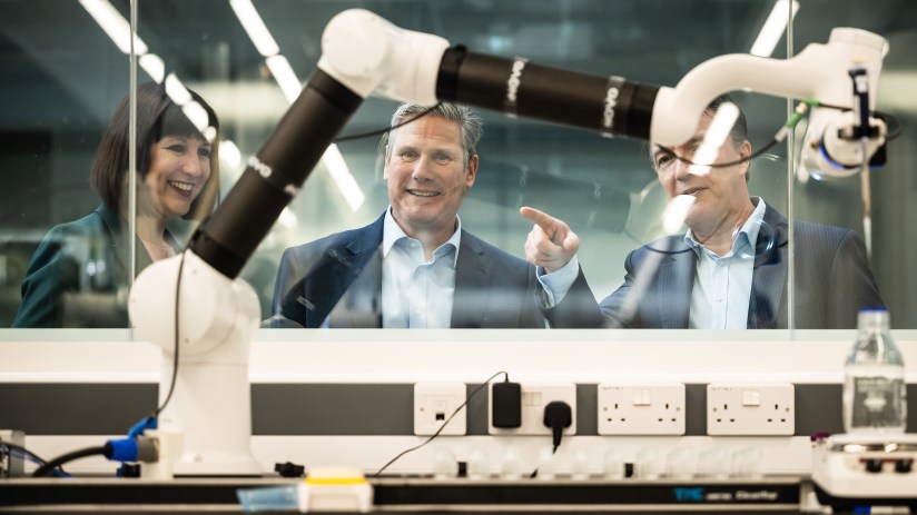 LIVERPOOL, ENGLAND - OCTOBER 08: Leader of the Labour Party Keir Starmer (C) and Shadow Chancellor Rachel Reeves (L) view robotic equipment during a visit to the Materials Innovation Factory on October 08, 2023 in Liverpool, England. The Labour Leader and Shadow Chancellor are in Liverpool for the party's annual Conference. (Photo by Leon Neal/Getty Images)