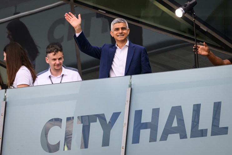 LONDON, ENGLAND - MAY 04: Incumbent Labour Mayor, Sadiq Khan, waves to photographers from the balcony of City Hall after winning an historic third term in office in the London mayoral election at City Hall on May 4, 2024 in London, England. Incumbent Labour Mayor, Sadiq Khan, received 1,088,000 votes, a majority of 275,000 over Conservative candidate, Susan Hall. (Photo by Leon Neal/Getty Images)