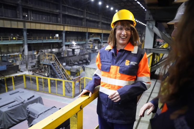 SCUNTHORPE, ENGLAND - APRIL 17: Chancellor of the Exchequer Rachel Reeves in the rail and sections hot end rolling mill during her visit to the British Steel site on April 17, 2025 in Scunthorpe, England. This weekend, the UK government passed emergency legislation to transfer control of British Steel's Scunthorpe site from Chinese owners Jingye Steel, who had said they were planning to permanently decommission its two blast furnaces. (Photo by Danny Lawson - WPA Pool/Getty Images)